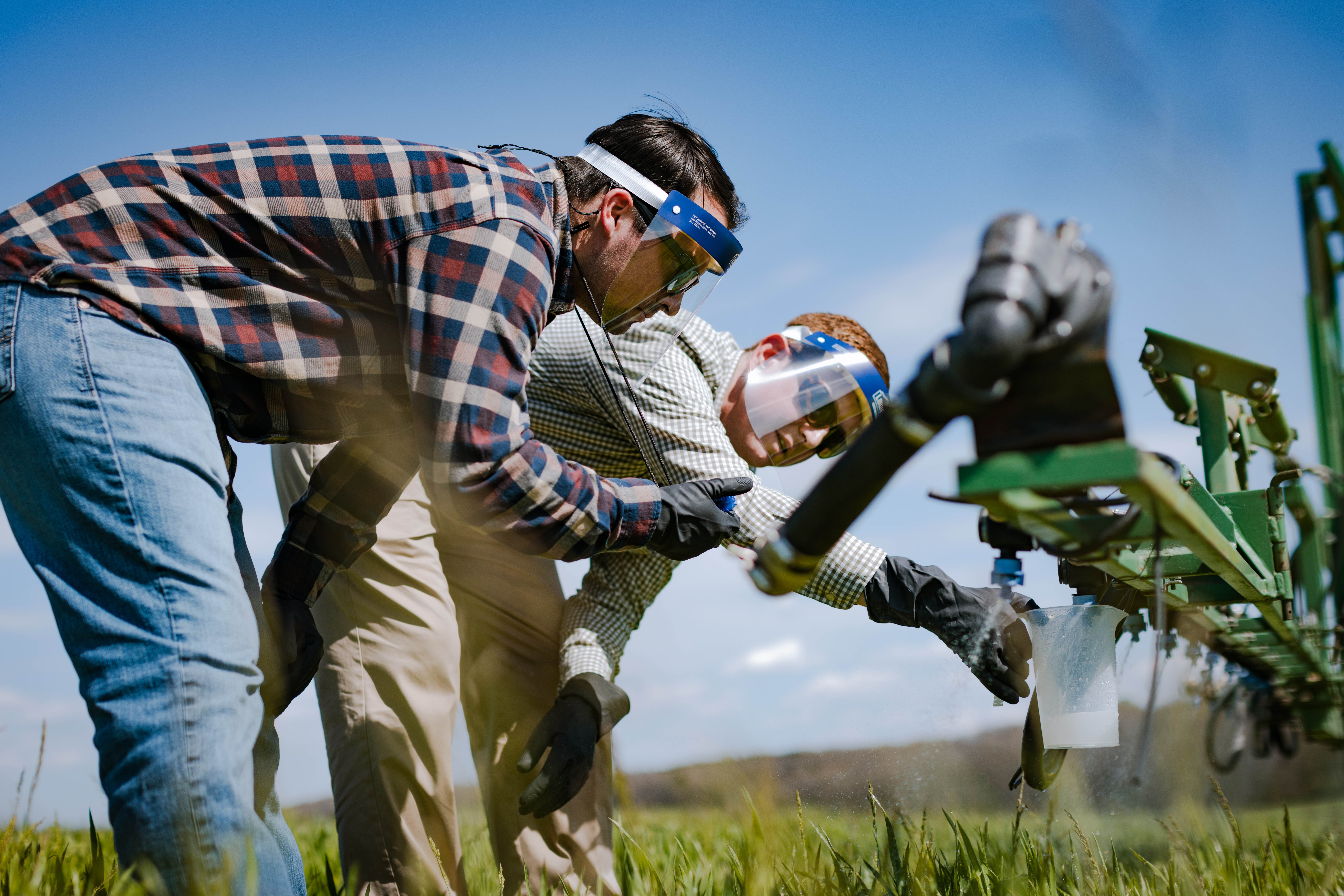Wes Gwaltney with equipment in field